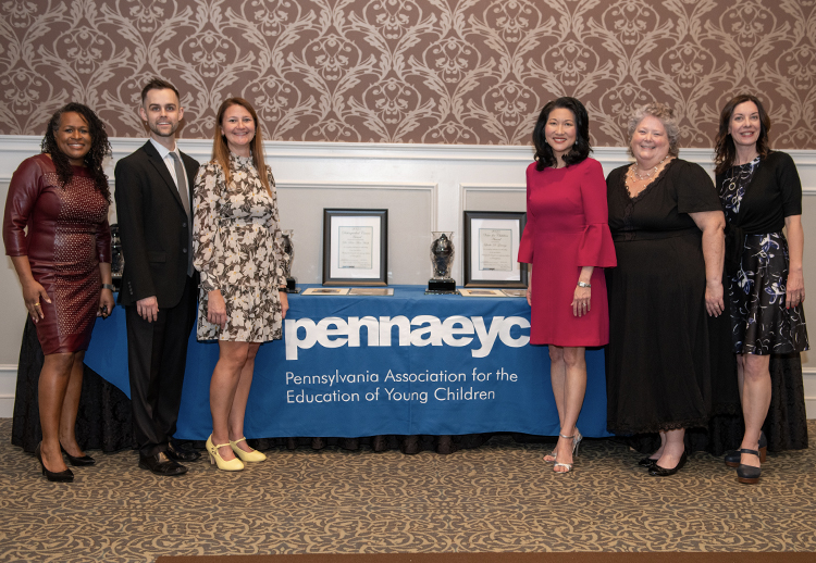 group around pennaeyc table at 2023 awards ceremony